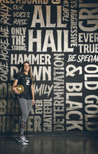 Chloe Chicoine with Purdue sign